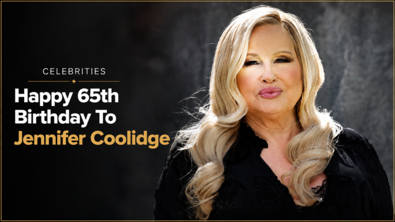 Jennifer Coolidge smiling during a celebrity interview featured in a story about Rafael Edholm’s response.