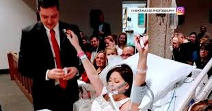 Bride and groom during an emotional hospital wedding before the bride’s death