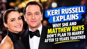Keri Russell and Matthew Rhys posing together at a red carpet event